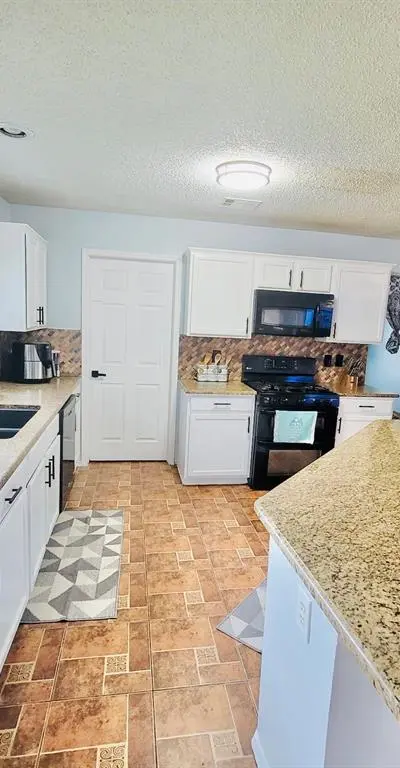 7406 Armstrong Lane, Rowlett TX 75089 - Photo 3