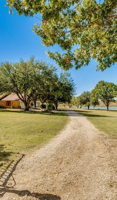 5547 Woodland Hills Drive, Denton TX 76208 - Photo 2