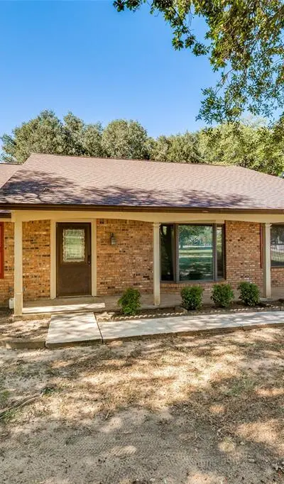 5547 Woodland Hills Drive, Denton TX 76208 - Photo 3